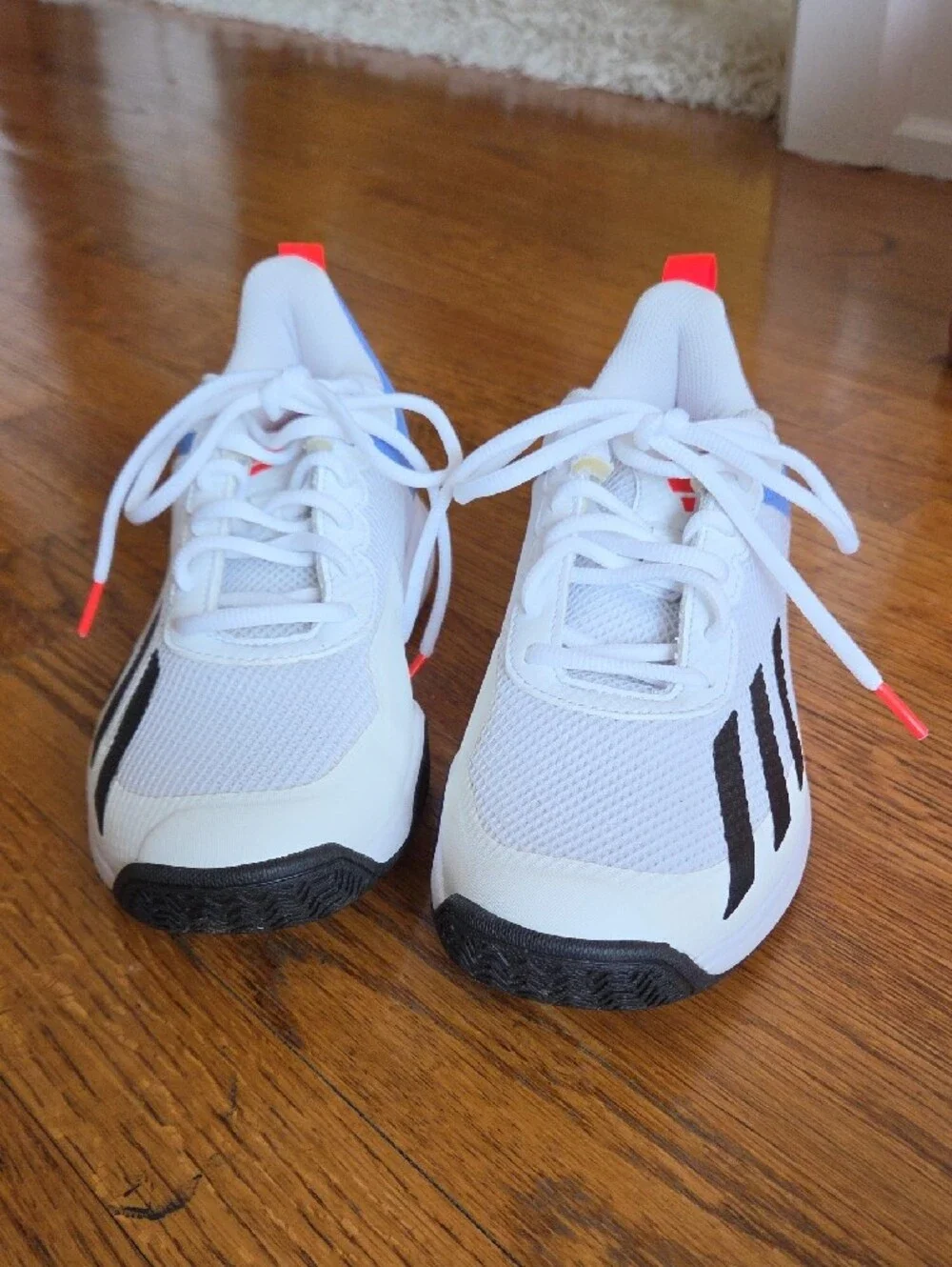 Adidas Kids White Sneakers with Blue and Black Accents